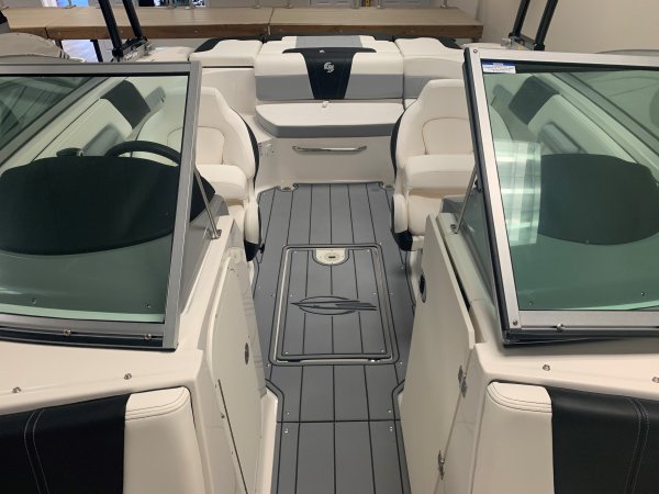 A ski boat is a boat specifically designed to safely tow one or more water skiers. This is achieved by using a high-horsepower, marinized automobile engine usually positioned in the midsection and driven through a direct drive to the propeller.