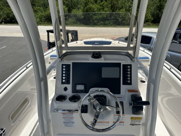 The definition of an outboard motor is a detachable engine mounted on outboard brackets on the stern of your boat.  This configuration will have only one single engine.