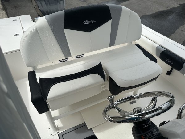 Glass fibers either loose or woven, reinforced with resin and used in the construction of many boats.