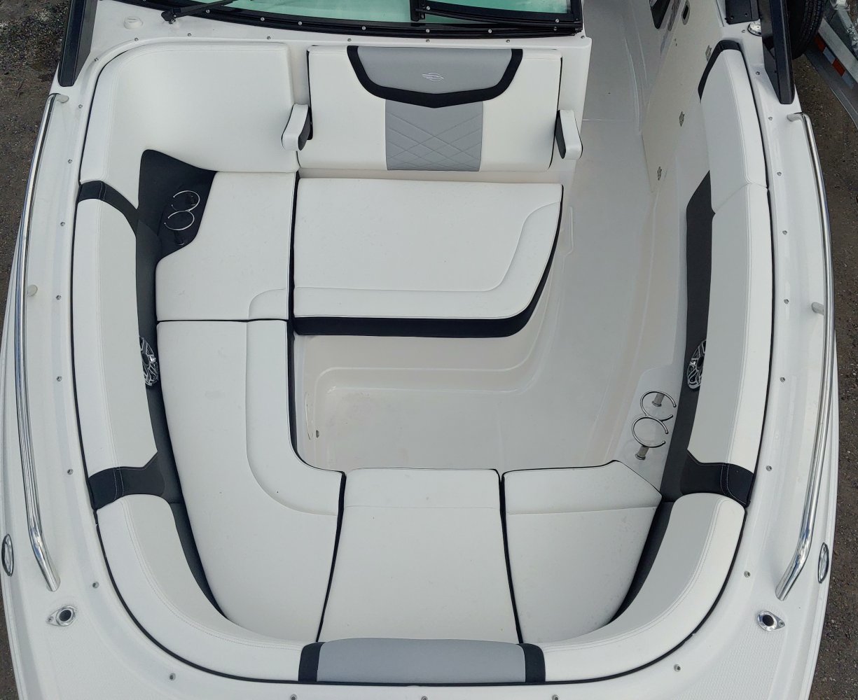 A bow rider is a boat with an open bow area where there are extra seats in front of the windshield.  Bow riders are typically between 17' and 30'long. They are well suited for many recreational water sports such as tubing, water skiing, and swimming.