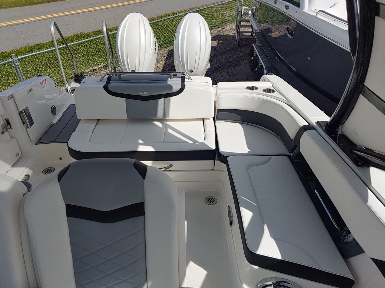 Glass fibers either loose or woven, reinforced with resin and used in the construction of many boats.
