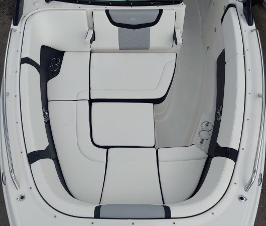 Glass fibers either loose or woven, reinforced with resin and used in the construction of many boats.