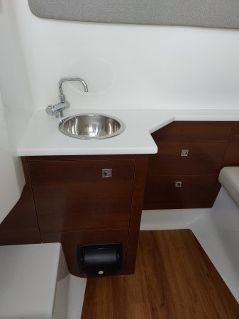 A bow rider is a boat with an open bow area where there are extra seats in front of the windshield.  Bow riders are typically between 17' and 30'long. They are well suited for many recreational water sports such as tubing, water skiing, and swimming.