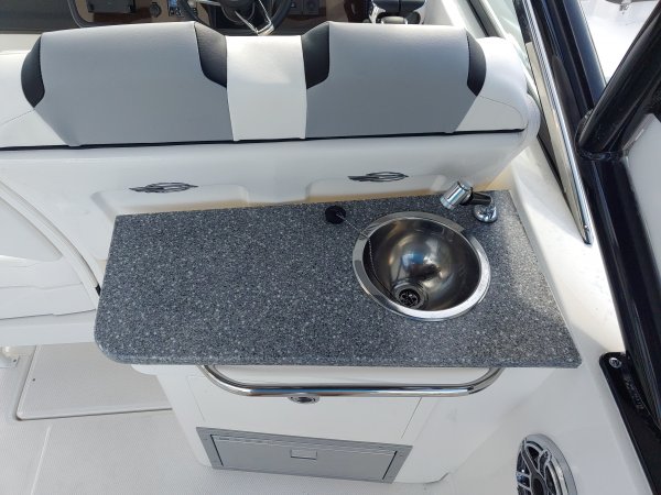 A bow rider is a boat with an open bow area where there are extra seats in front of the windshield.  Bow riders are typically between 17' and 30'long. They are well suited for many recreational water sports such as tubing, water skiing, and swimming.