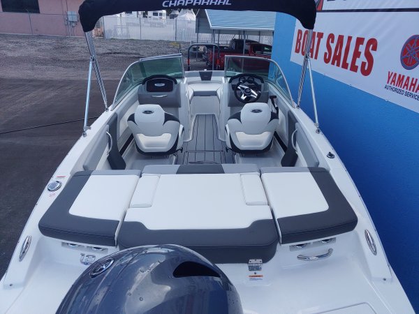 The definition of an outboard motor is a detachable engine mounted on outboard brackets on the stern of your boat.  This configuration will have only one single engine.