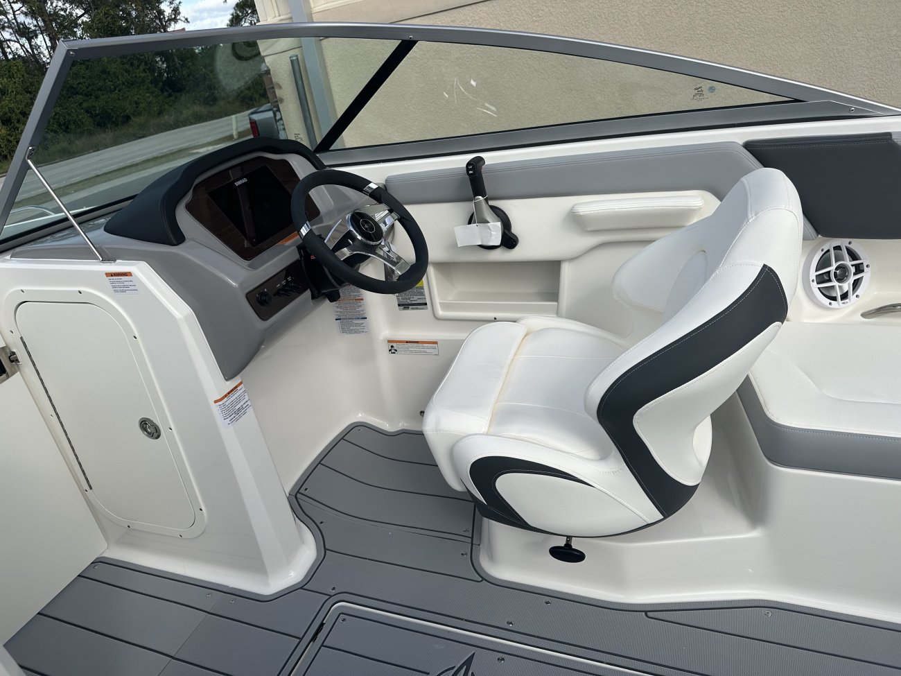 Wakeboarders want a giant wake to launch from as they cross from left to right behind the boat. With the engine set back against the transom, these boats carve a steep, large wake that riders love.