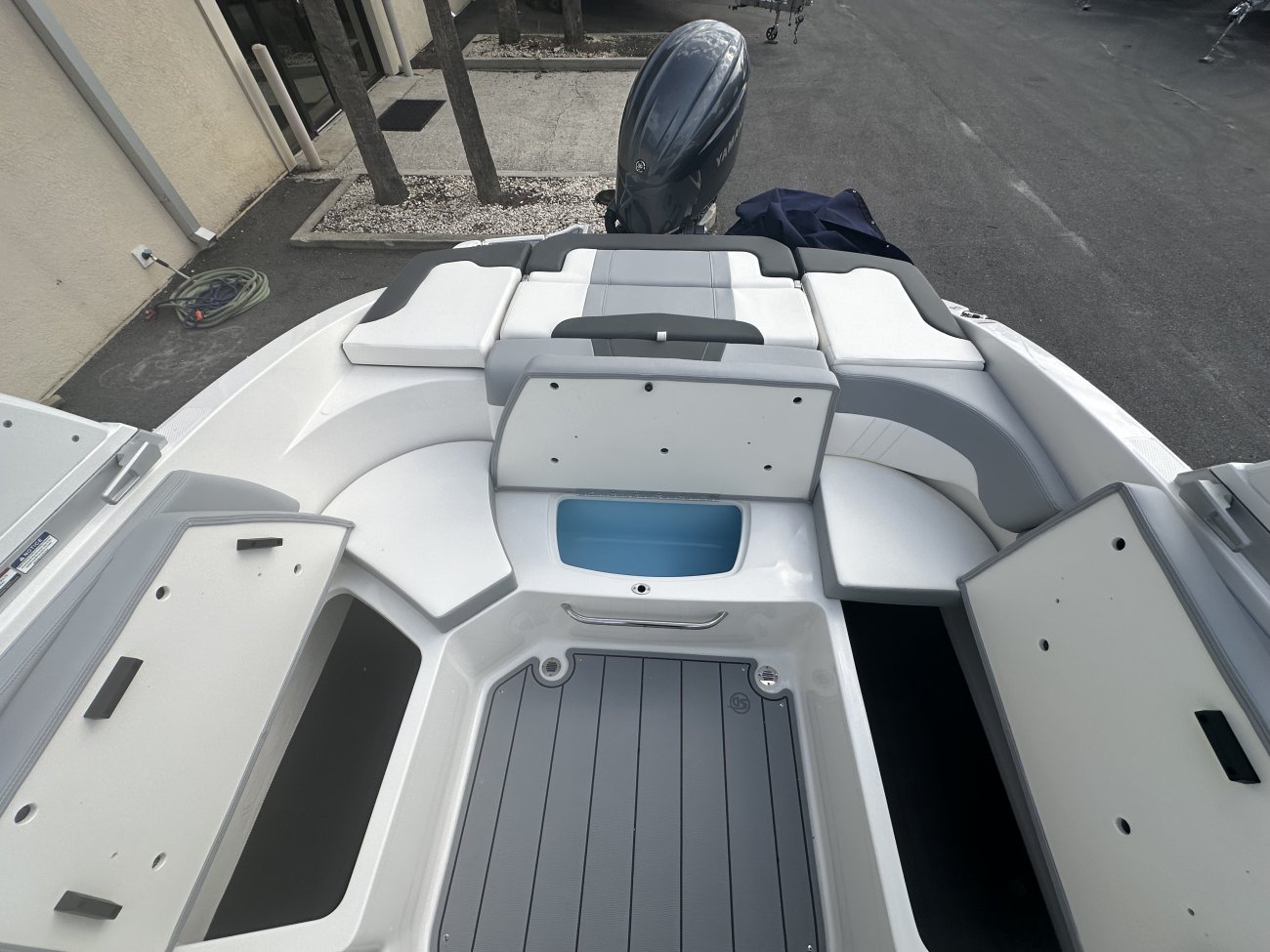 A dual console boat is typically one that was designed for salt water fishing and has the console split around a center walk thru to the bow.  The helm is usually starboard while there is passenger seating to port.