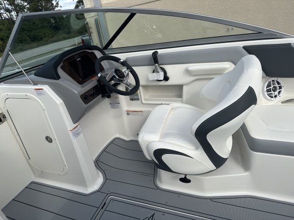 Wakeboarders want a giant wake to launch from as they cross from left to right behind the boat. With the engine set back against the transom, these boats carve a steep, large wake that riders love.