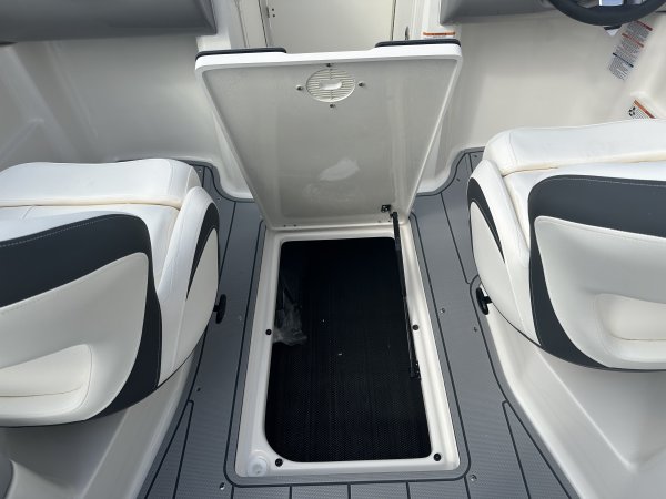 Glass fibers either loose or woven, reinforced with resin and used in the construction of many boats.