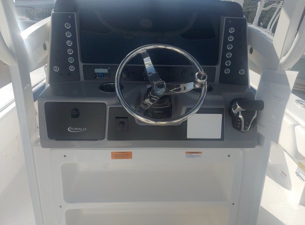The definition of an outboard motor is a detachable engine mounted on outboard brackets on the stern of your boat.  This configuration will have only one single engine.