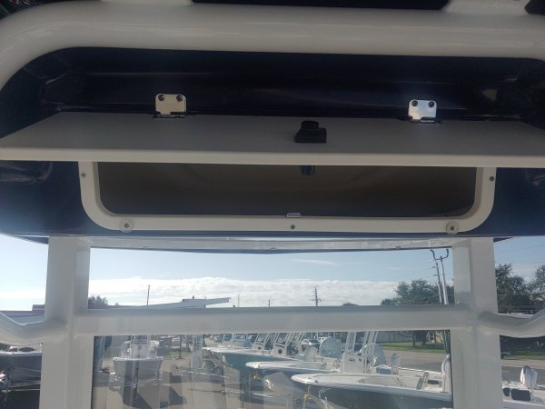 The definition of an outboard motor is a detachable engine mounted on outboard brackets on the stern of your boat.  This configuration will have only one single engine.