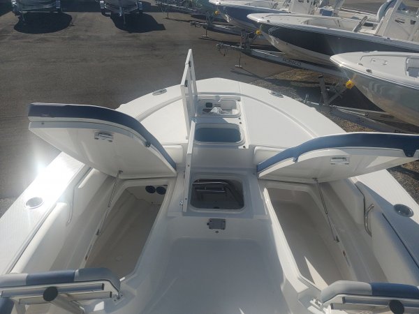 Wakeboarders want a giant wake to launch from as they cross from left to right behind the boat. With the engine set back against the transom, these boats carve a steep, large wake that riders love.