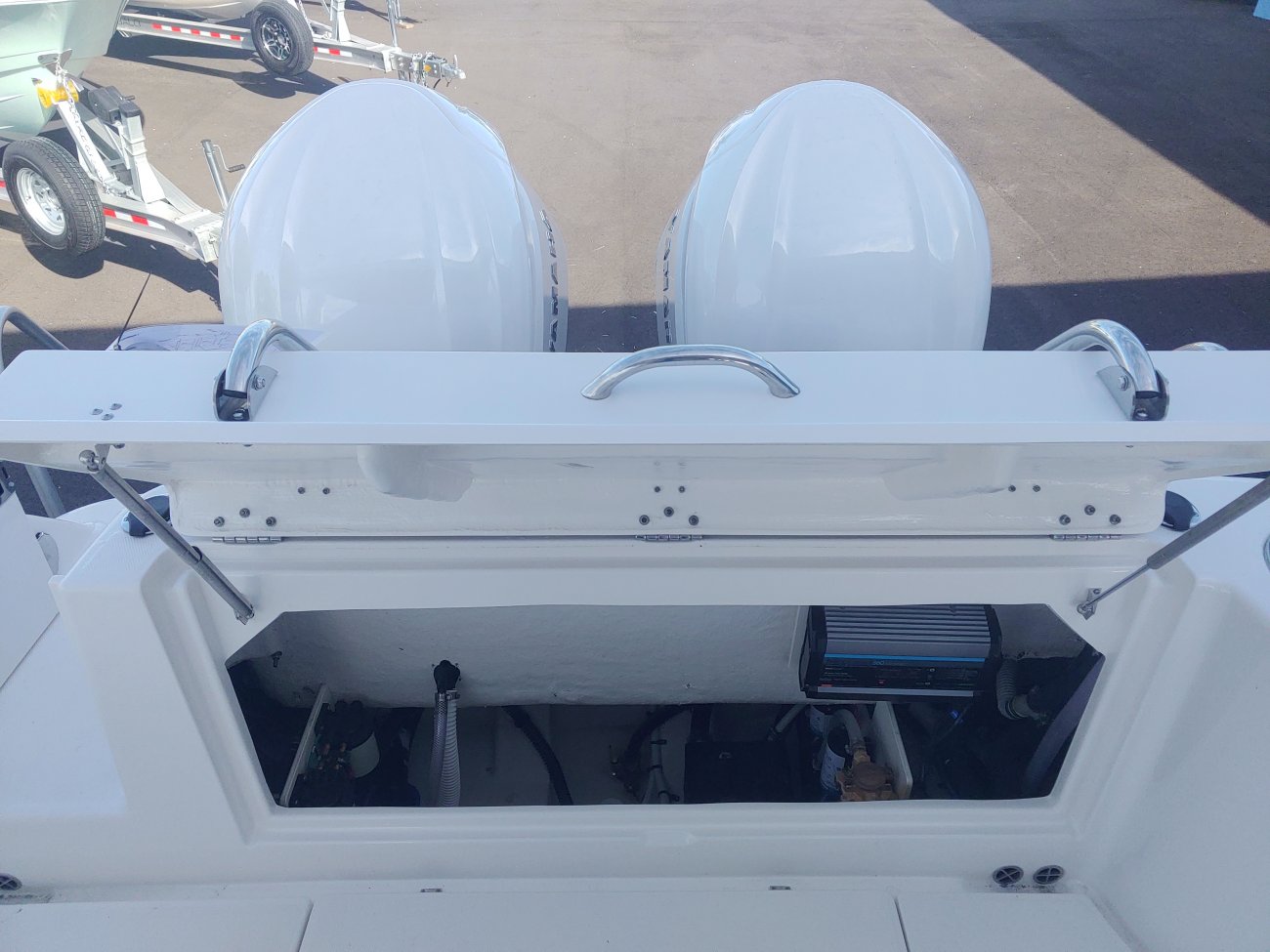 Glass fibers either loose or woven, reinforced with resin and used in the construction of many boats.