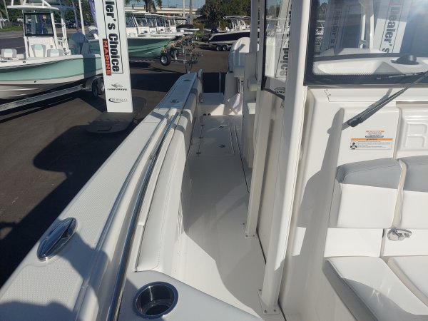 The definition of an outboard motor is a detachable engine mounted on outboard brackets on the stern of your boat.  This configuration will have triple engines.