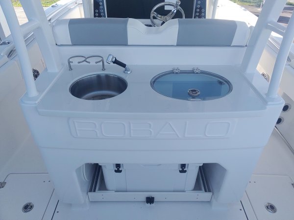 Center console is an open hull boat where the console of the boat is in the center. The boat deck surrounds the console so that a person can walk all around the boat from stern to bow with ease. Most center consoles are powered by outboard motors.