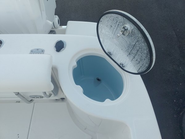 The definition of an outboard motor is a detachable engine mounted on outboard brackets on the stern of your boat.  This configuration will have triple engines.