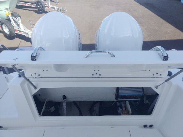 Glass fibers either loose or woven, reinforced with resin and used in the construction of many boats.