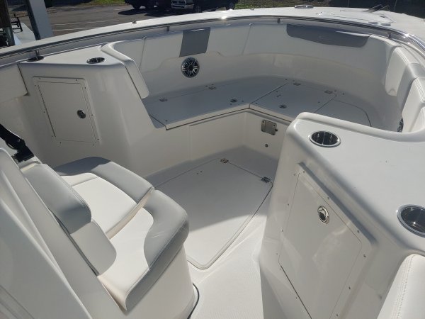 Glass fibers either loose or woven, reinforced with resin and used in the construction of many boats.