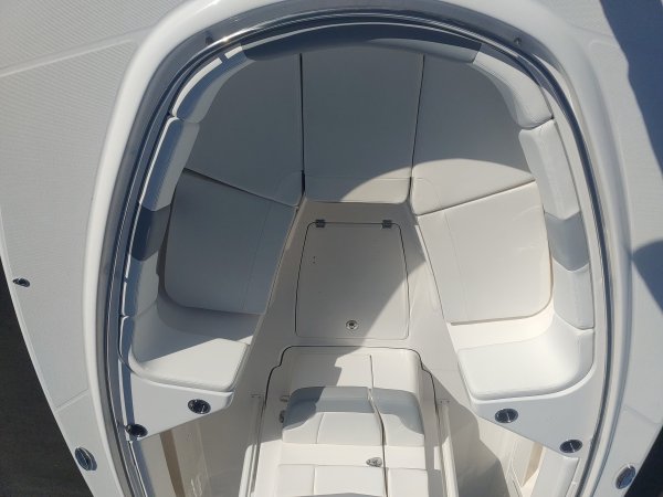 Center console is an open hull boat where the console of the boat is in the center. The boat deck surrounds the console so that a person can walk all around the boat from stern to bow with ease. Most center consoles are powered by outboard motors.