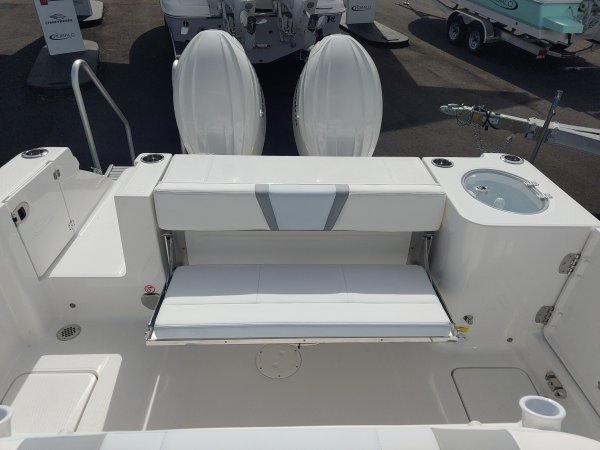 Center console is an open hull boat where the console of the boat is in the center. The boat deck surrounds the console so that a person can walk all around the boat from stern to bow with ease. Most center consoles are powered by outboard motors.
