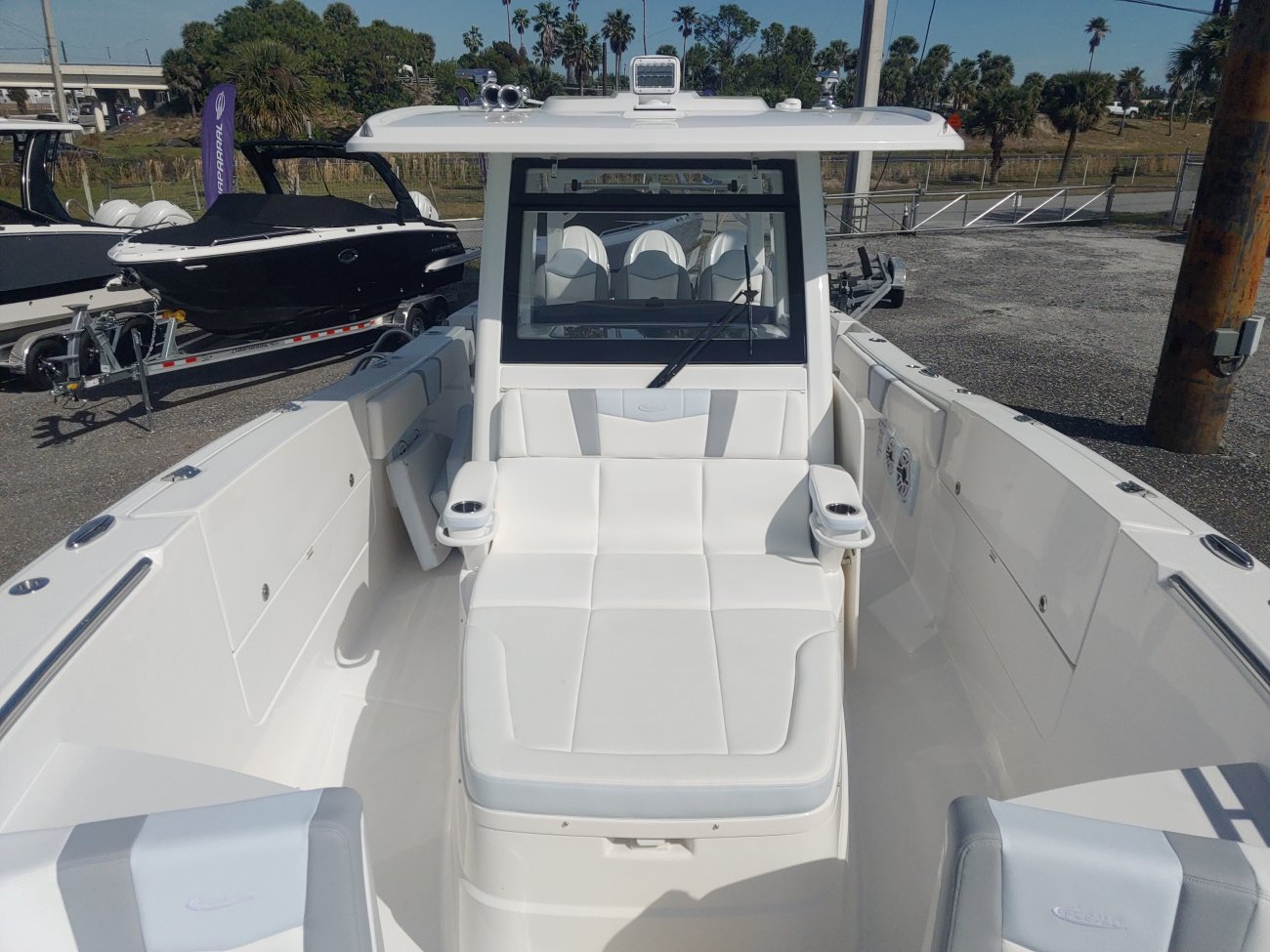 Generally, a Sportfisherman will be a large craft with a fly bridge and outriggers designed to pursue big game fish.  These will be 35 feet up in length and contain all of the amenities to handle heavy blue water.