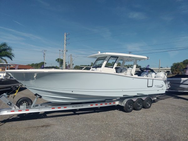 Generally, a Sportfisherman will be a large craft with a fly bridge and outriggers designed to pursue big game fish.  These will be 35 feet up in length and contain all of the amenities to handle heavy blue water.