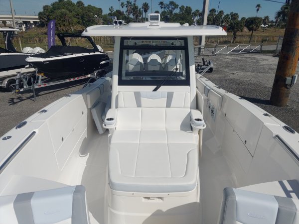 Generally, a Sportfisherman will be a large craft with a fly bridge and outriggers designed to pursue big game fish.  These will be 35 feet up in length and contain all of the amenities to handle heavy blue water.