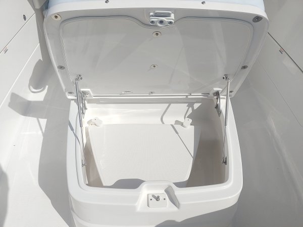 Glass fibers either loose or woven, reinforced with resin and used in the construction of many boats.