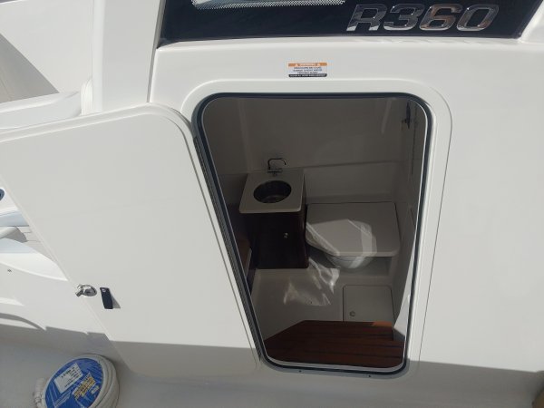 Glass fibers either loose or woven, reinforced with resin and used in the construction of many boats.