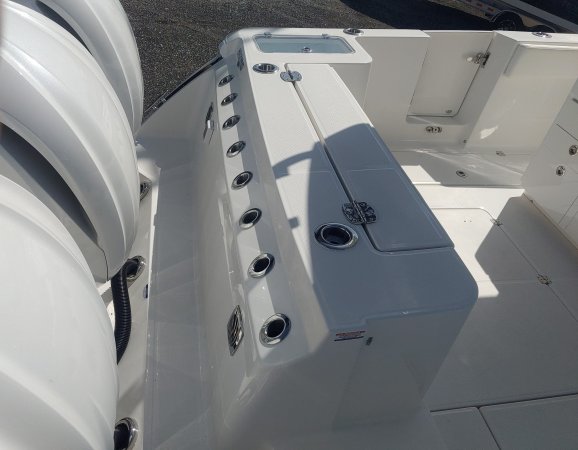 Glass fibers either loose or woven, reinforced with resin and used in the construction of many boats.