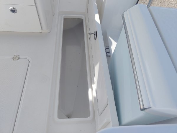 Center console is an open hull boat where the console of the boat is in the center. The boat deck surrounds the console so that a person can walk all around the boat from stern to bow with ease. Most center consoles are powered by outboard motors.