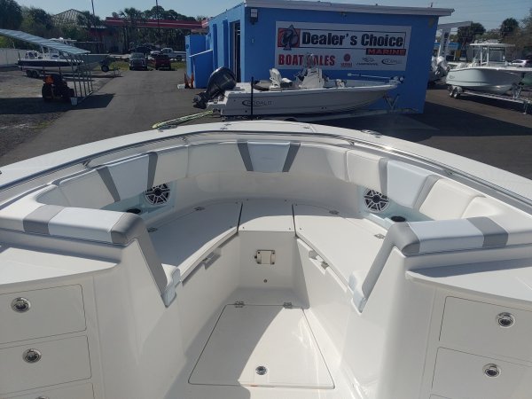 Center console is an open hull boat where the console of the boat is in the center. The boat deck surrounds the console so that a person can walk all around the boat from stern to bow with ease. Most center consoles are powered by outboard motors.