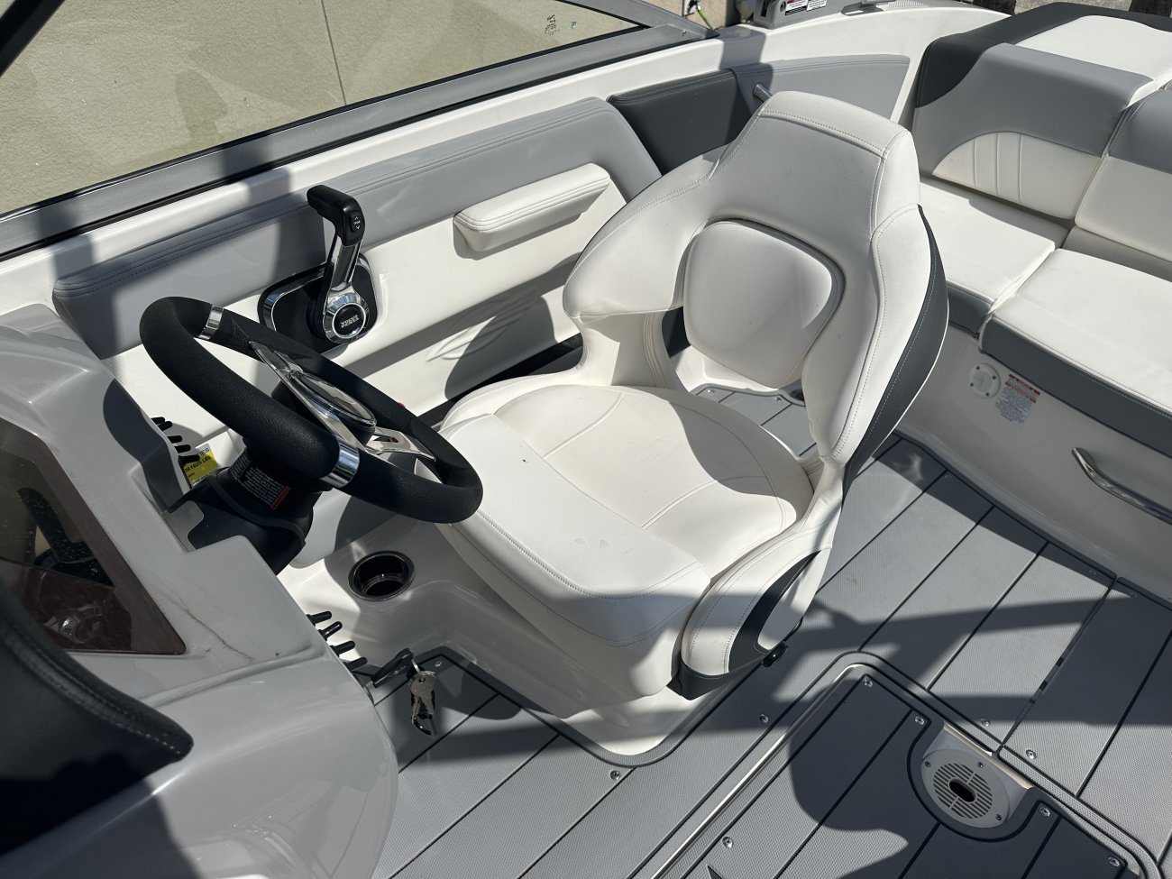 A ski boat is a boat specifically designed to safely tow one or more water skiers. This is achieved by using a high-horsepower, marinized automobile engine usually positioned in the midsection and driven through a direct drive to the propeller.