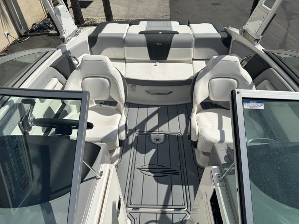 Glass fibers either loose or woven, reinforced with resin and used in the construction of many boats.
