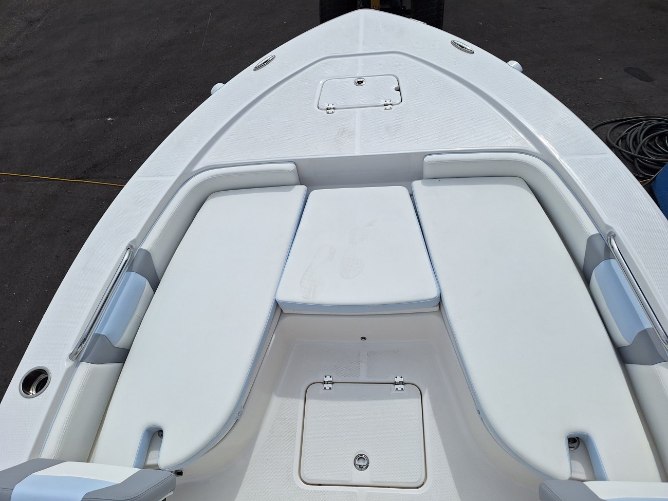 Center console is an open hull boat where the console of the boat is in the center. The boat deck surrounds the console so that a person can walk all around the boat from stern to bow with ease. Most center consoles are powered by outboard motors.