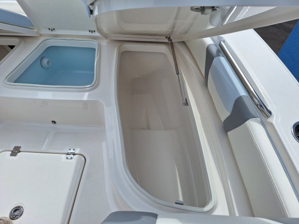 Center console is an open hull boat where the console of the boat is in the center. The boat deck surrounds the console so that a person can walk all around the boat from stern to bow with ease. Most center consoles are powered by outboard motors.