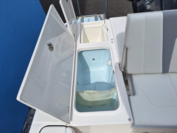 The definition of an outboard motor is a detachable engine mounted on outboard brackets on the stern of your boat.  This configuration will have only one single engine.