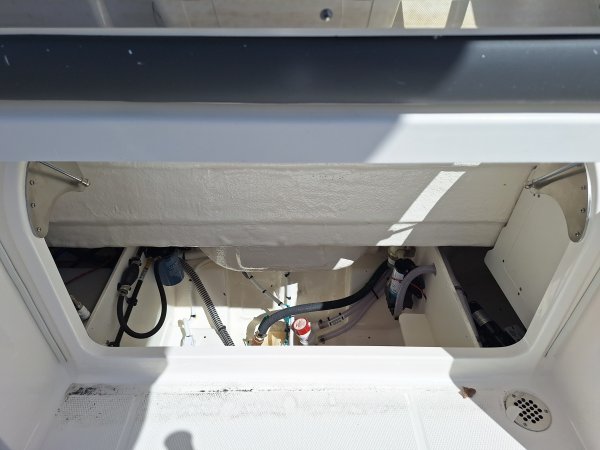 Glass fibers either loose or woven, reinforced with resin and used in the construction of many boats.