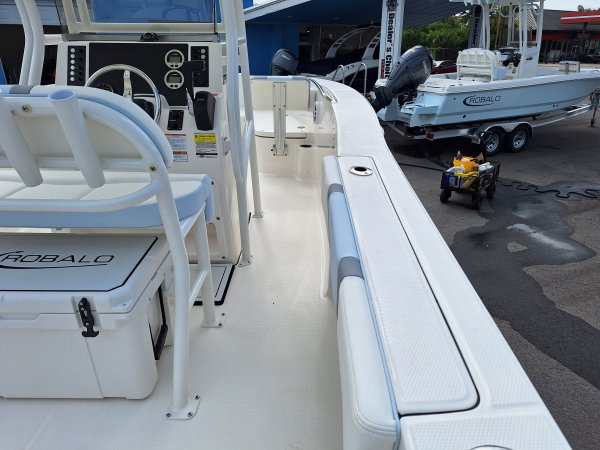 Glass fibers either loose or woven, reinforced with resin and used in the construction of many boats.
