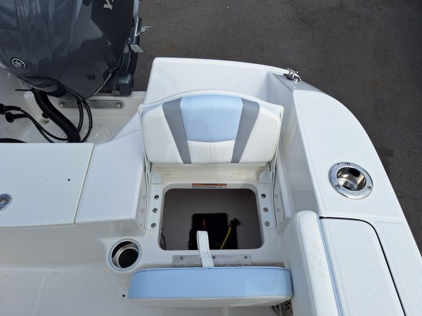 Glass fibers either loose or woven, reinforced with resin and used in the construction of many boats.