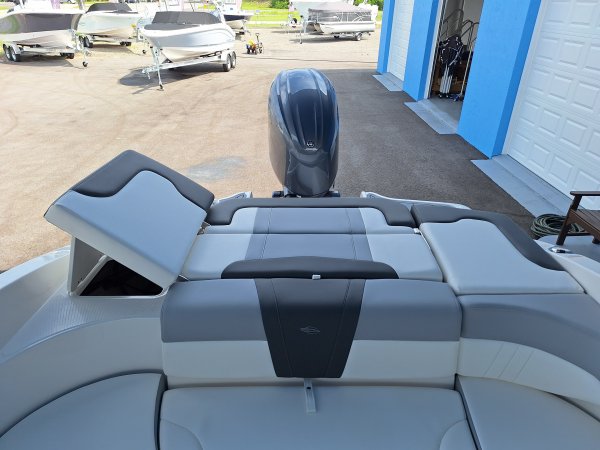 The definition of an outboard motor is a detachable engine mounted on outboard brackets on the stern of your boat.  This configuration will have only one single engine.