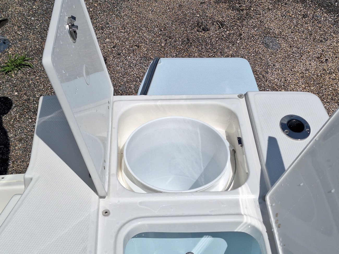 Center console is an open hull boat where the console of the boat is in the center. The boat deck surrounds the console so that a person can walk all around the boat from stern to bow with ease. Most center consoles are powered by outboard motors.