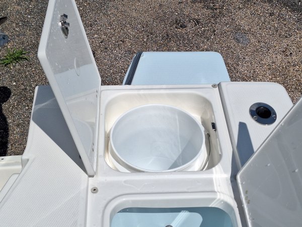 Center console is an open hull boat where the console of the boat is in the center. The boat deck surrounds the console so that a person can walk all around the boat from stern to bow with ease. Most center consoles are powered by outboard motors.
