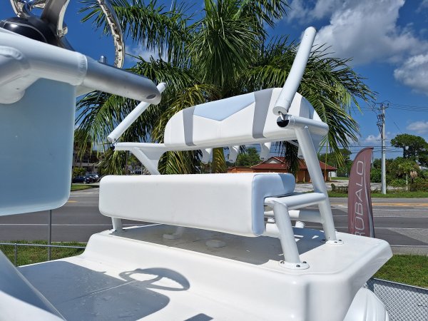 Glass fibers either loose or woven, reinforced with resin and used in the construction of many boats.